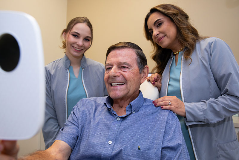 All-on-4 dental implants in The Woodlands TX providing permanent same-day teeth restoration